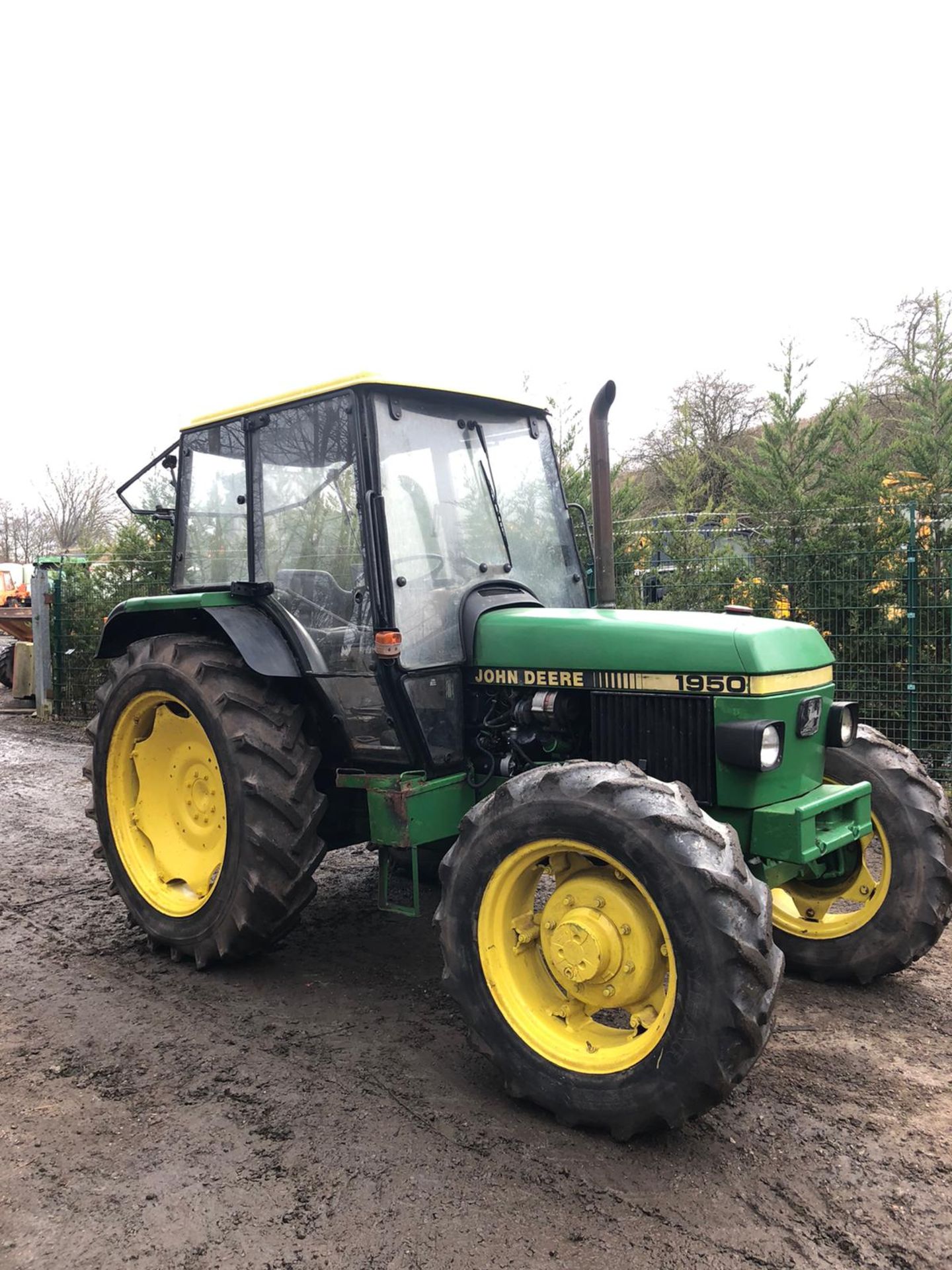 JOHN DEERE 1950 TRACTOR, 4 WHEEL DRIVE, FULL GLASS CAB, RUNS, WORKS, DOES EVERYTHING IT SHOULD