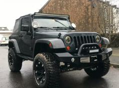 2007 swb Jeep Wrangler VERY LOW MILES AT JUST 47000 Interior is half leather and in good condition