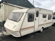 ELDISS WISP 510 SE 4 BERTH CARAVAN, LARGE FRONT DOUBLE BENCH SEATS WHICH CAN BE USED AS SINGLE BEDS