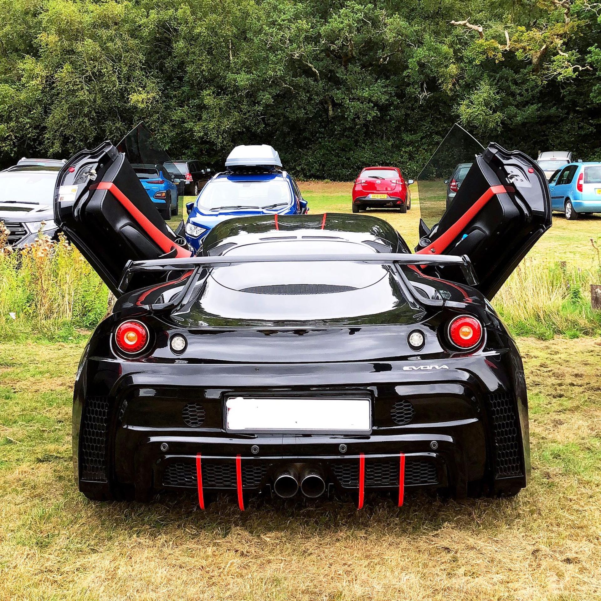 LOTUS EVORA 2010 BLACK FULL OPTION RED INTERIOR MANUAL GEAR RECARO SEATS. EXHAUST SYSTEMS *PLUS VAT* - Image 6 of 7