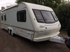 ELDDIS CRUSADER SUPER STORM TWIN AXLE TOWABLE 4 BERTH CARAVAN, AIR CON, AWNINGS, PORCH *NO VAT*