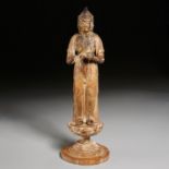 Antique carved giltwood standing Buddha