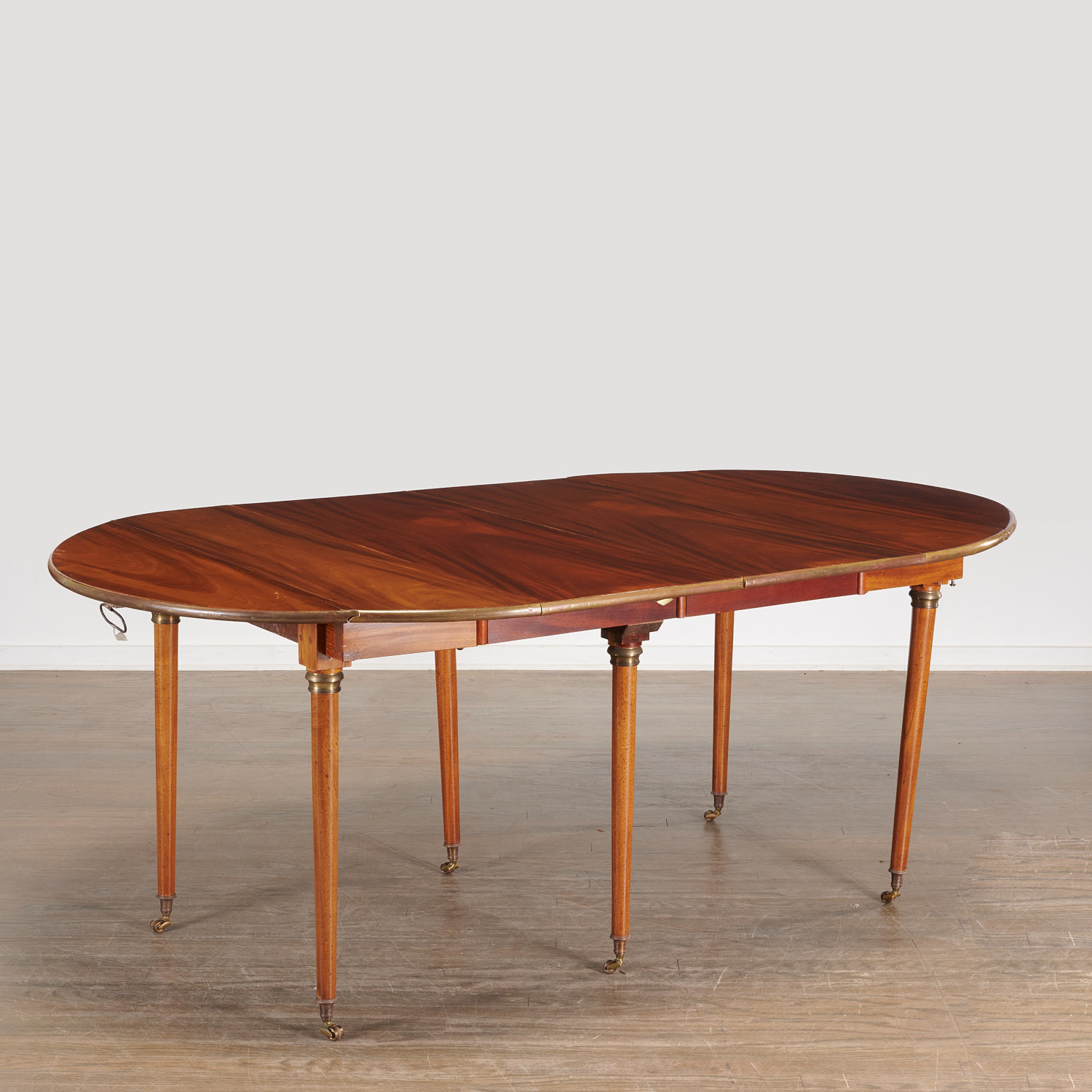 Louis XVI mahogany extension dining table