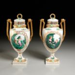 Fine pair Meissen hand painted lidded urns