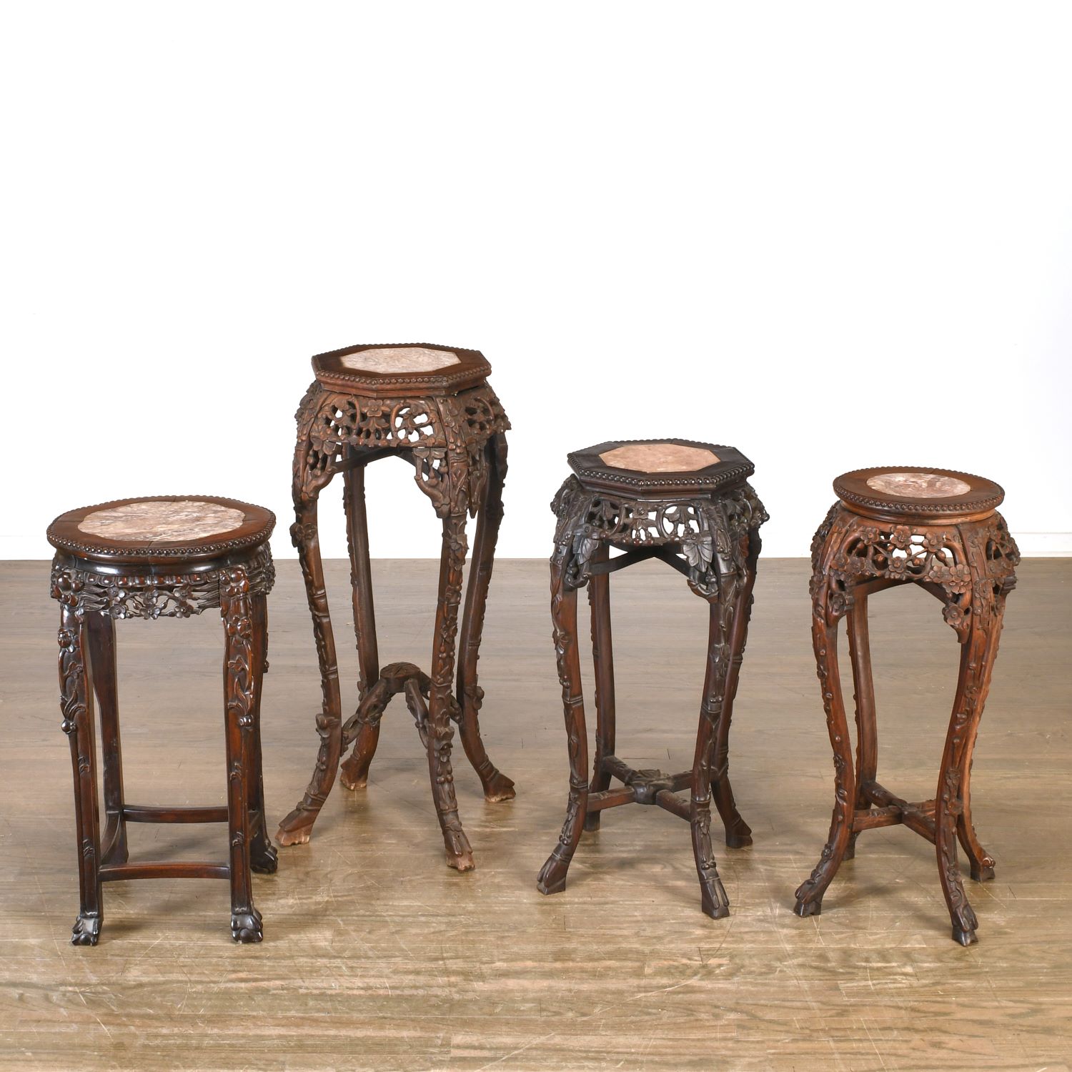 (4) Chinese carved hardwood, marble inset stands