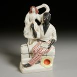 Staffordshire style Uncle Tom & Eva figure