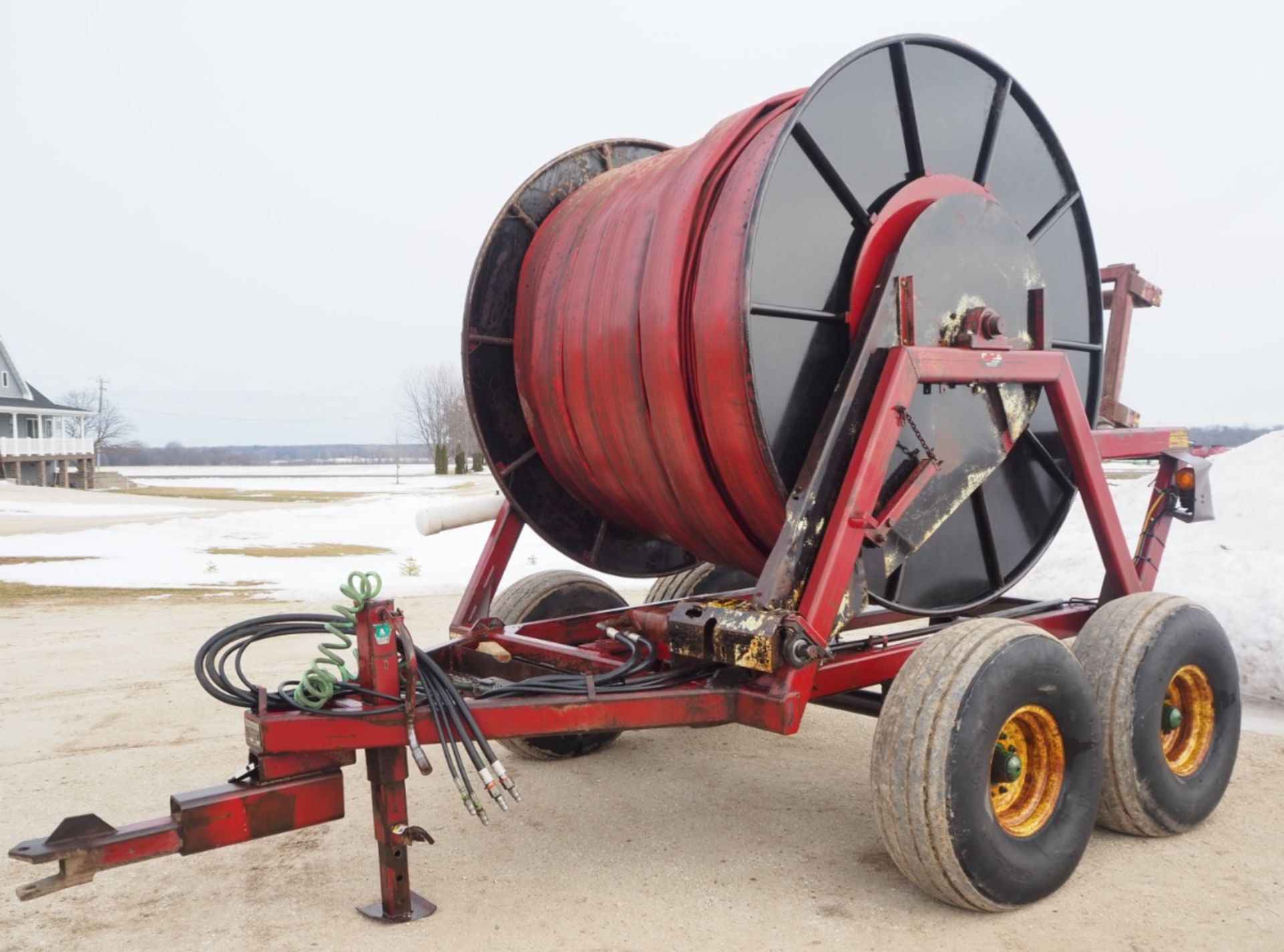 RED MANURE HOSE REEL