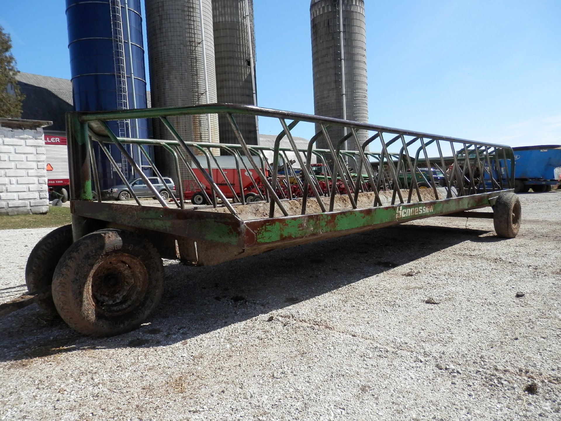 SCHOESSOW 20' FRONT DOLLY WHEEL SLANT BAR FEEDER WAGON