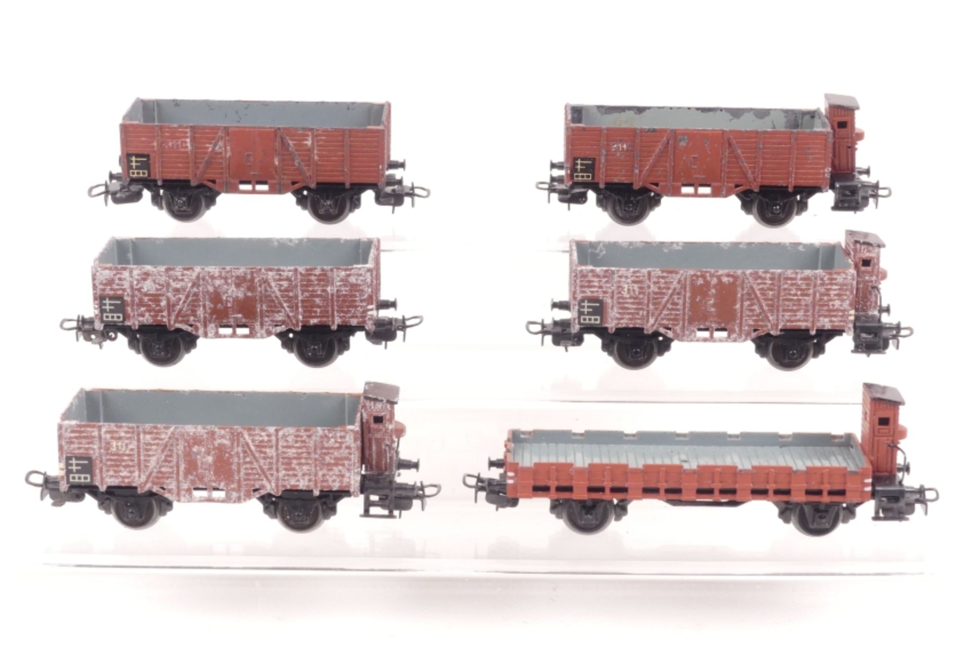 Märklin 6 Gussgüterwagen, 2 x 311 offener Güterwagen braun, 3x 315 offener Güterwagen mit Brems