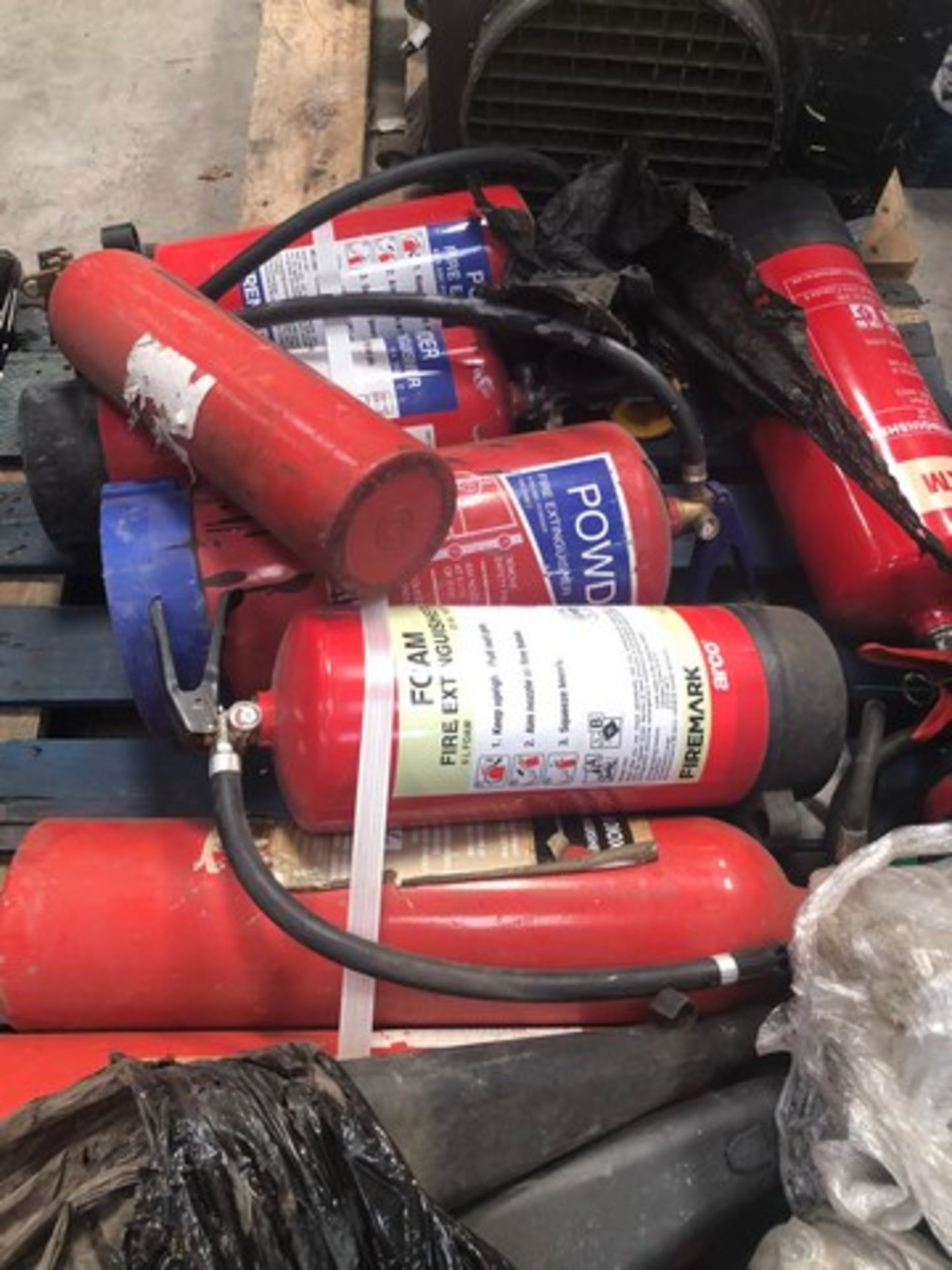 Mixed pallet of fire extinguishers approx 10