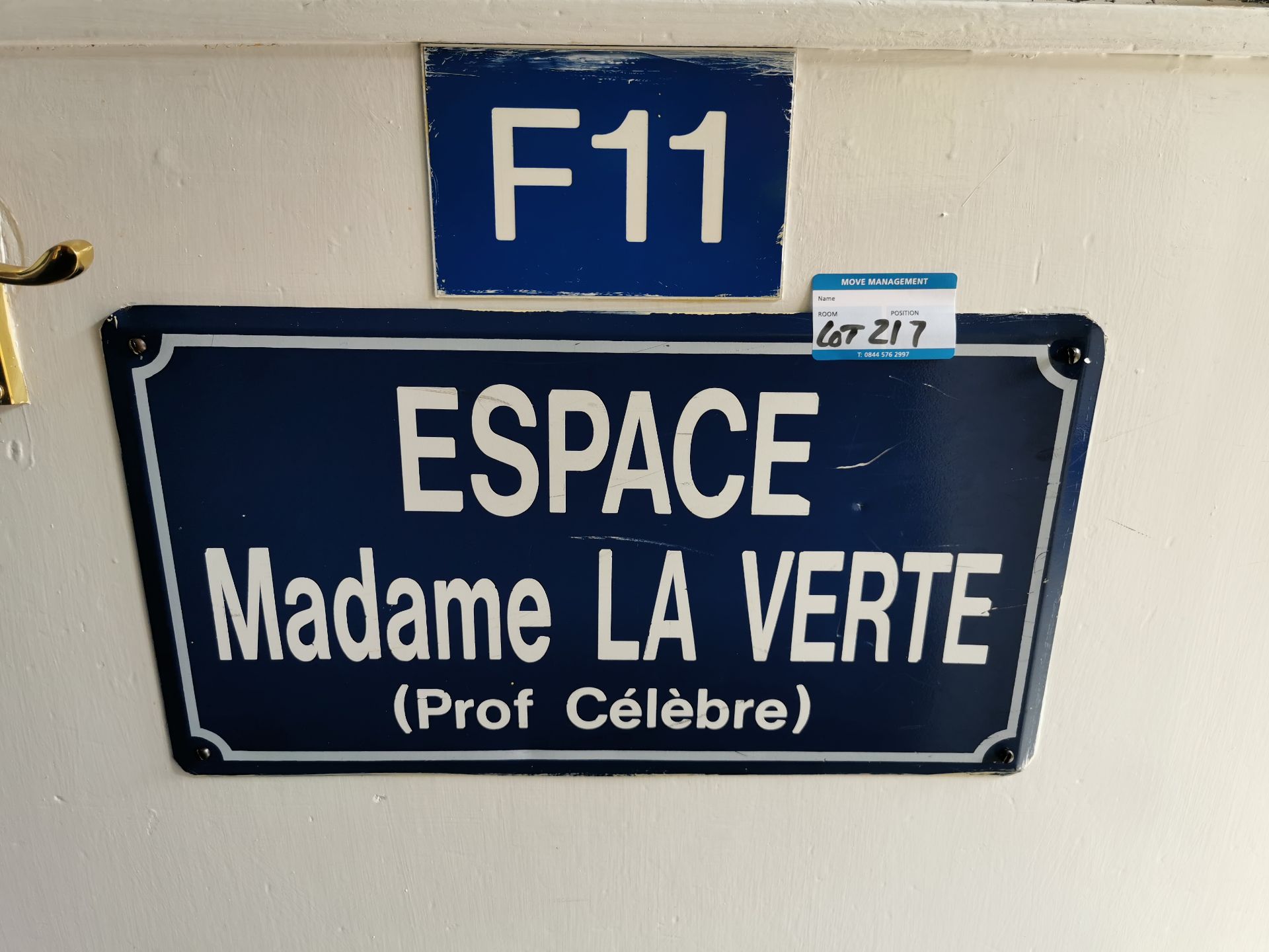 king's french and 'F11' door sign