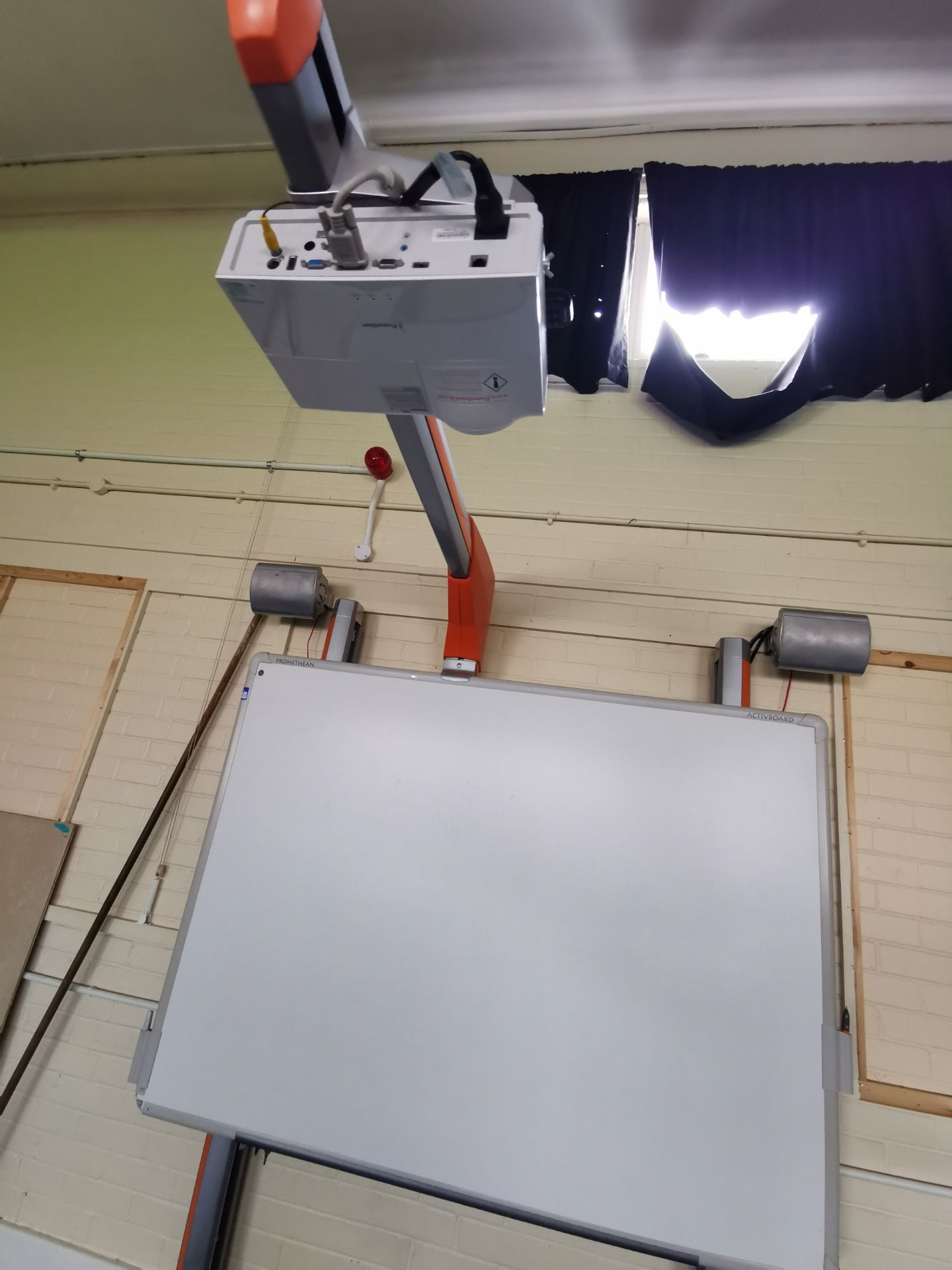 Promethean active board, projector and speakers [on stand]
