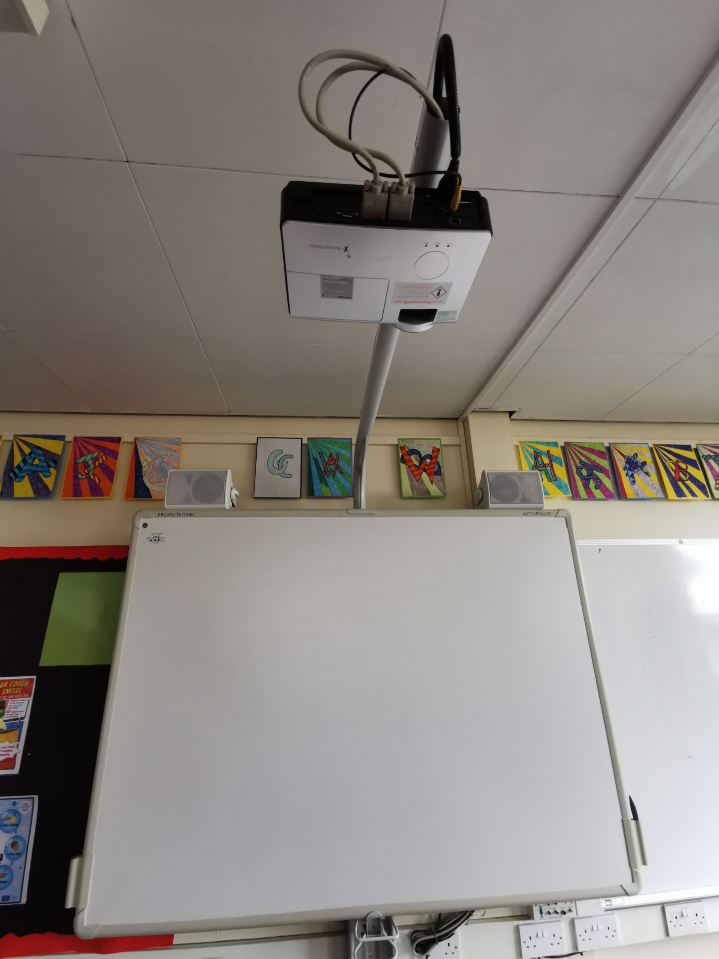 Promethean active board, projector and speakers [on stand]