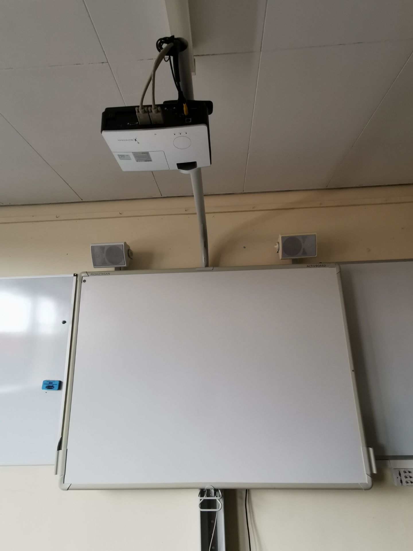 Promethean active board, projector and speakers [on stand]