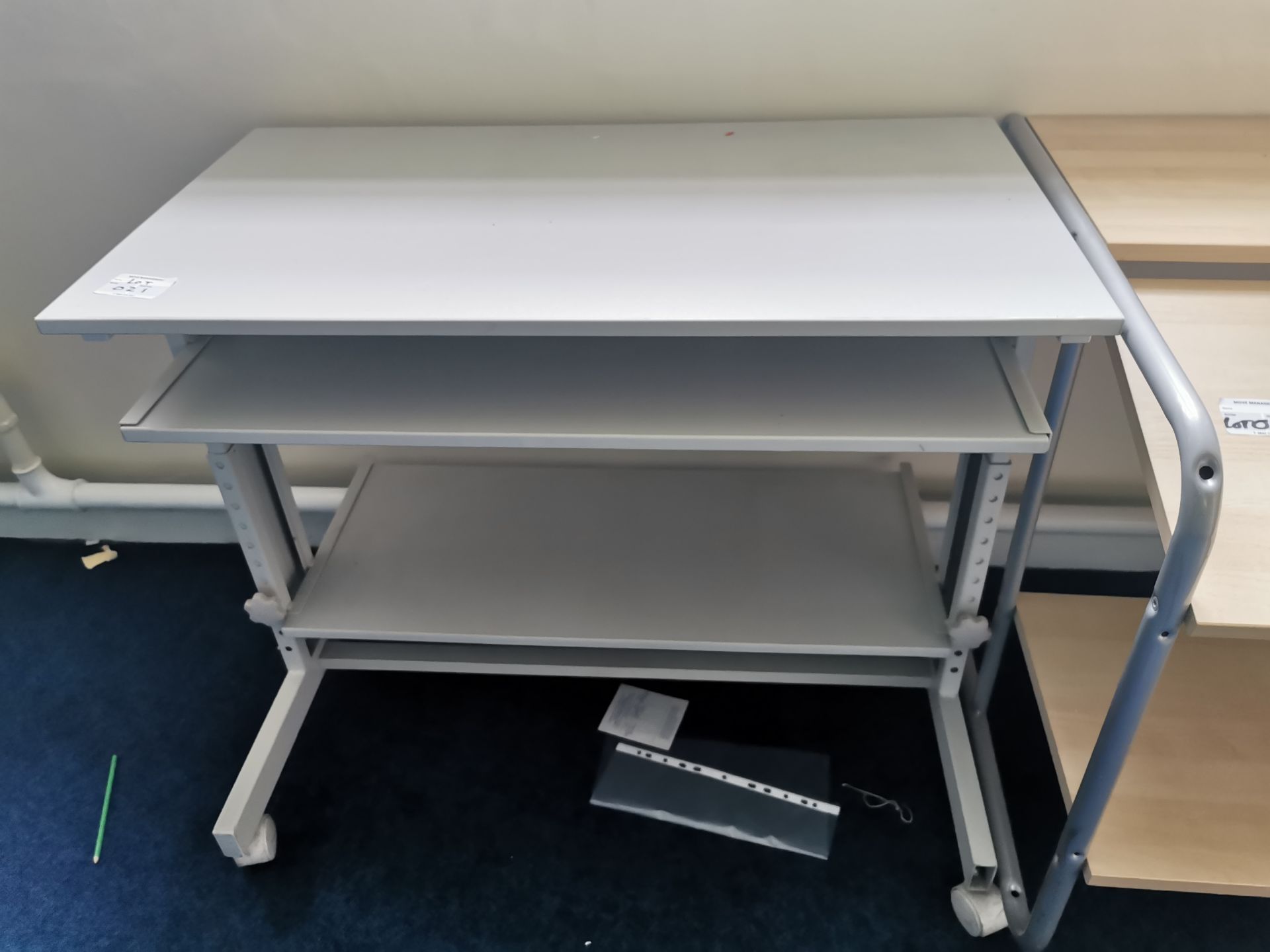 Grey mobile computer desk