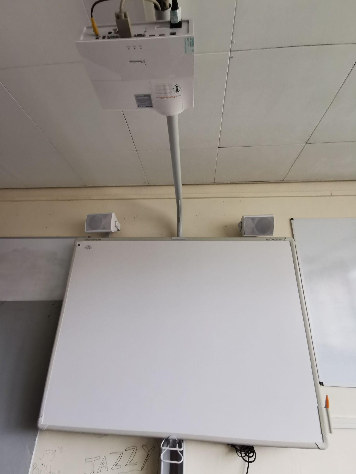 Promethean active board, projector and speakers [on stand]