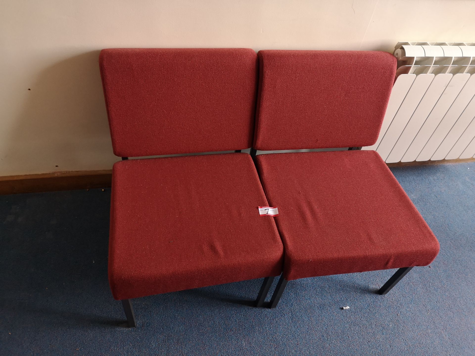 2x Red upholstered lounge chairs