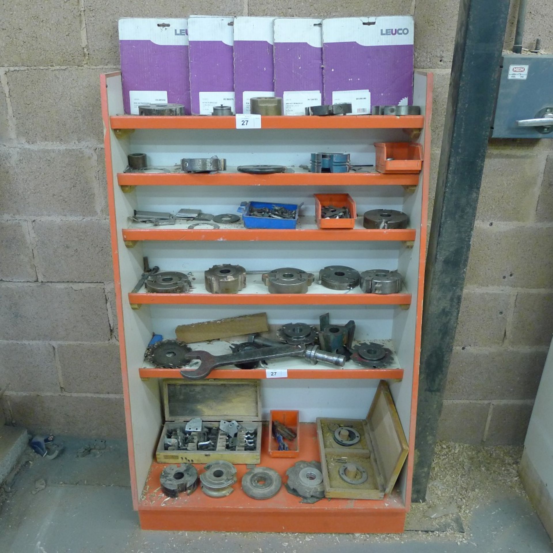 1 shelf unit containing a quantity of various cutting blocks and other items including a 5 blade