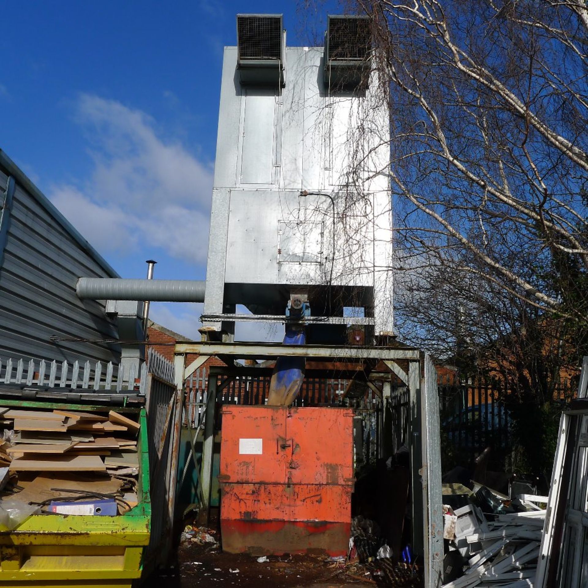 A large dust extraction unit, 3ph situated outside on right hand side of the workshops. The