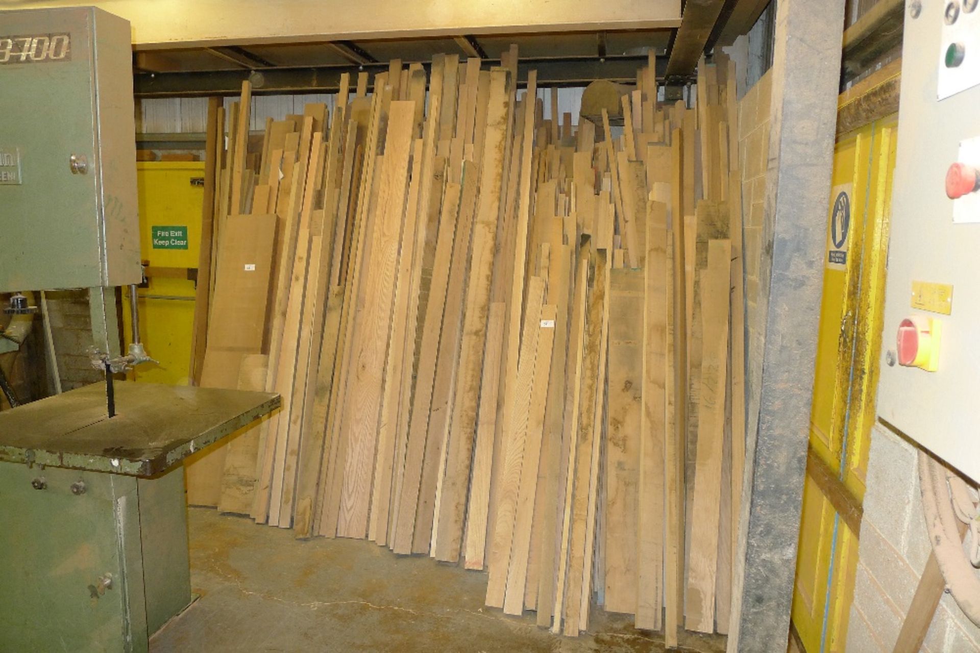 A large quantity of various timber mainly European oak and sapele. Leaning on rear wall the first