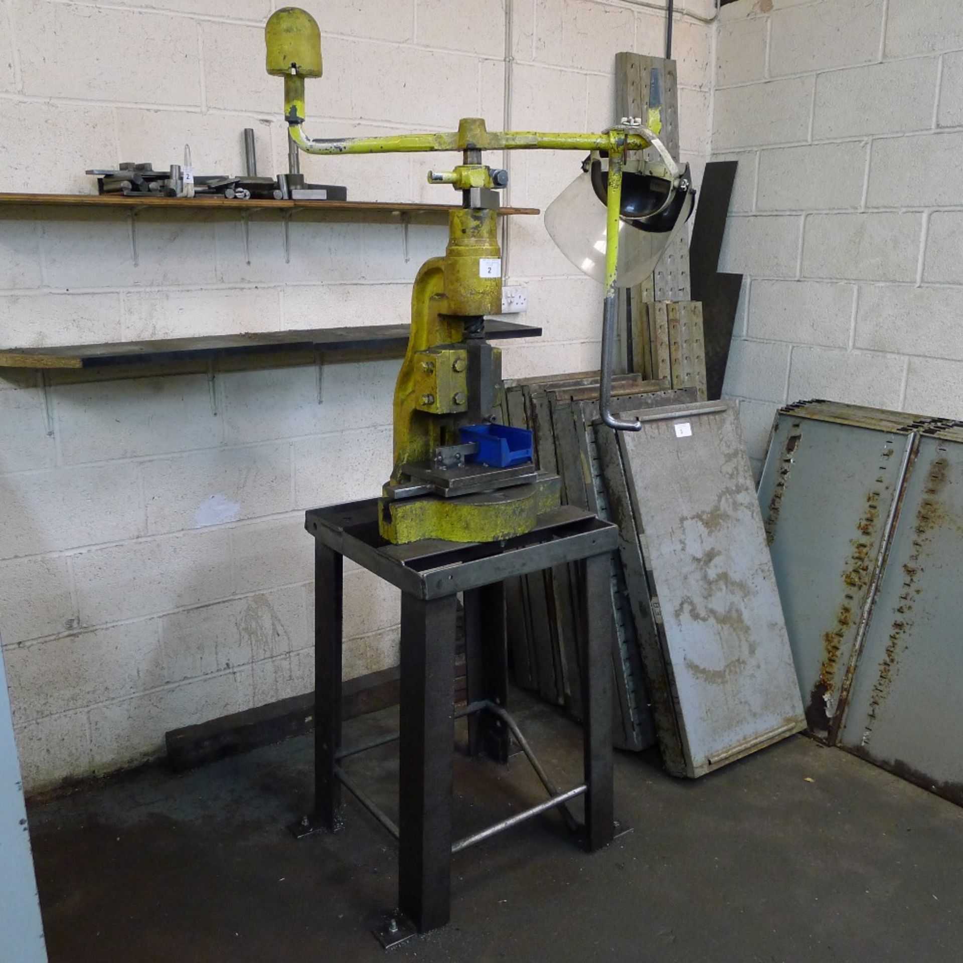 1 Norton fly press no. 4 on stand with over arm, 1 weight and tooling on shelf behind