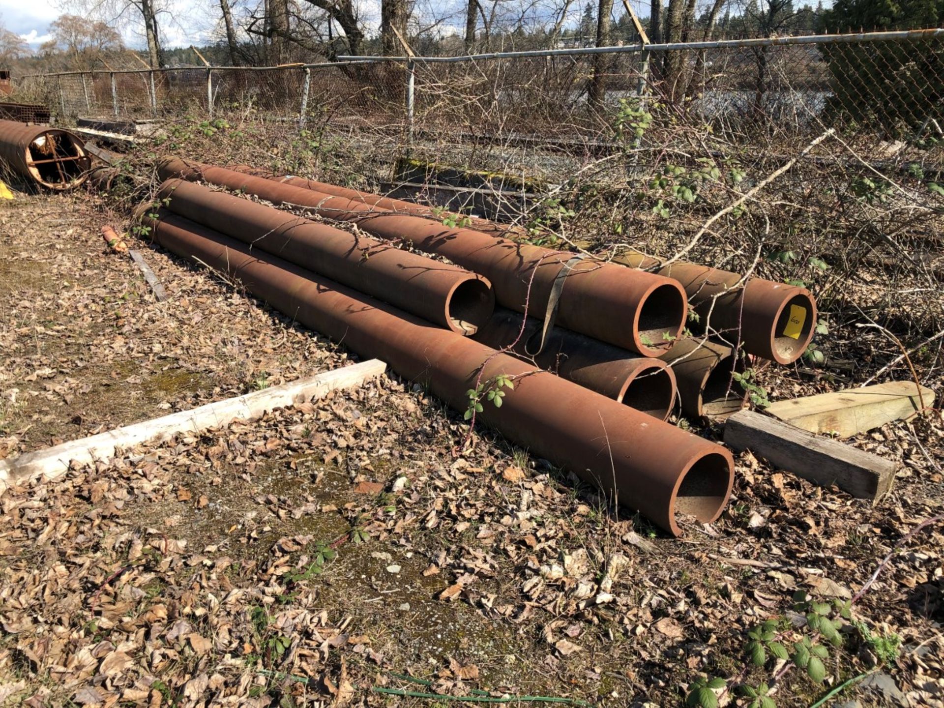 All Scrap Metal along South Fence (row begins at pile of steel tube about 40' East of railway