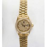 Goldene Rolex-Damenarmbanduhr,