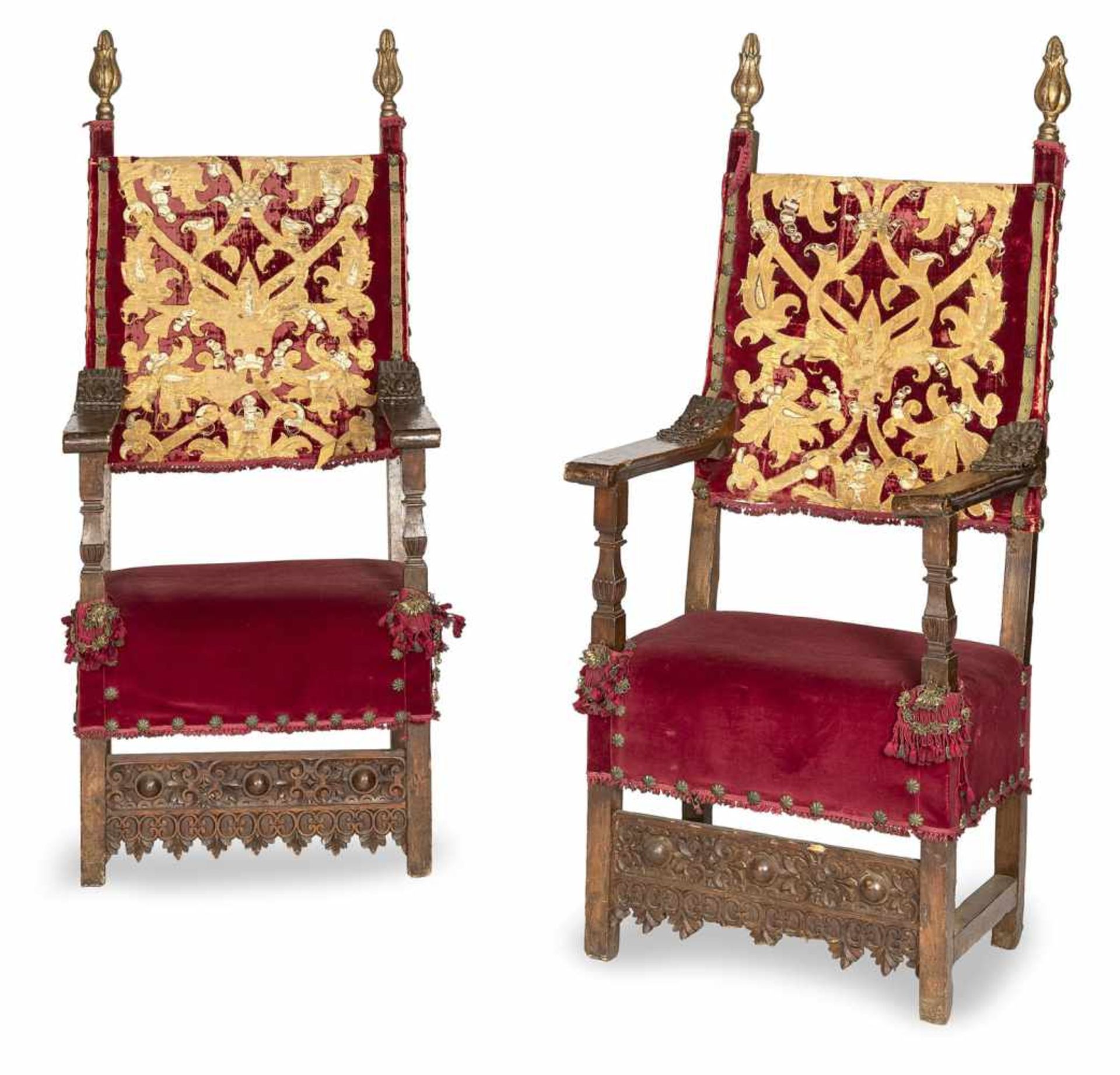A pair of Renaissance carved walnut armchairs, probably Genova, 17th ct. Rest. Minor damages.