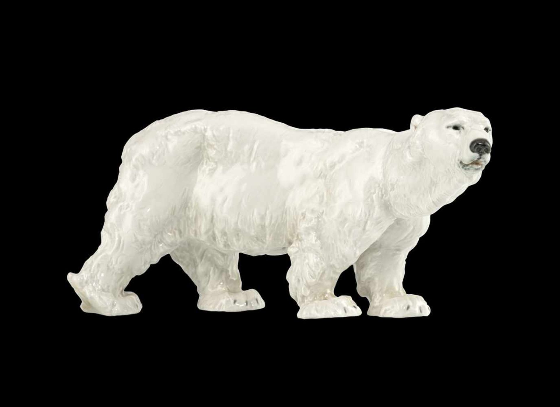 SMALL MEISSEN PORCELAIN ICE BEAR, 1924-34. Model by Otto Jarl of the year 1903. Blue sword marks,