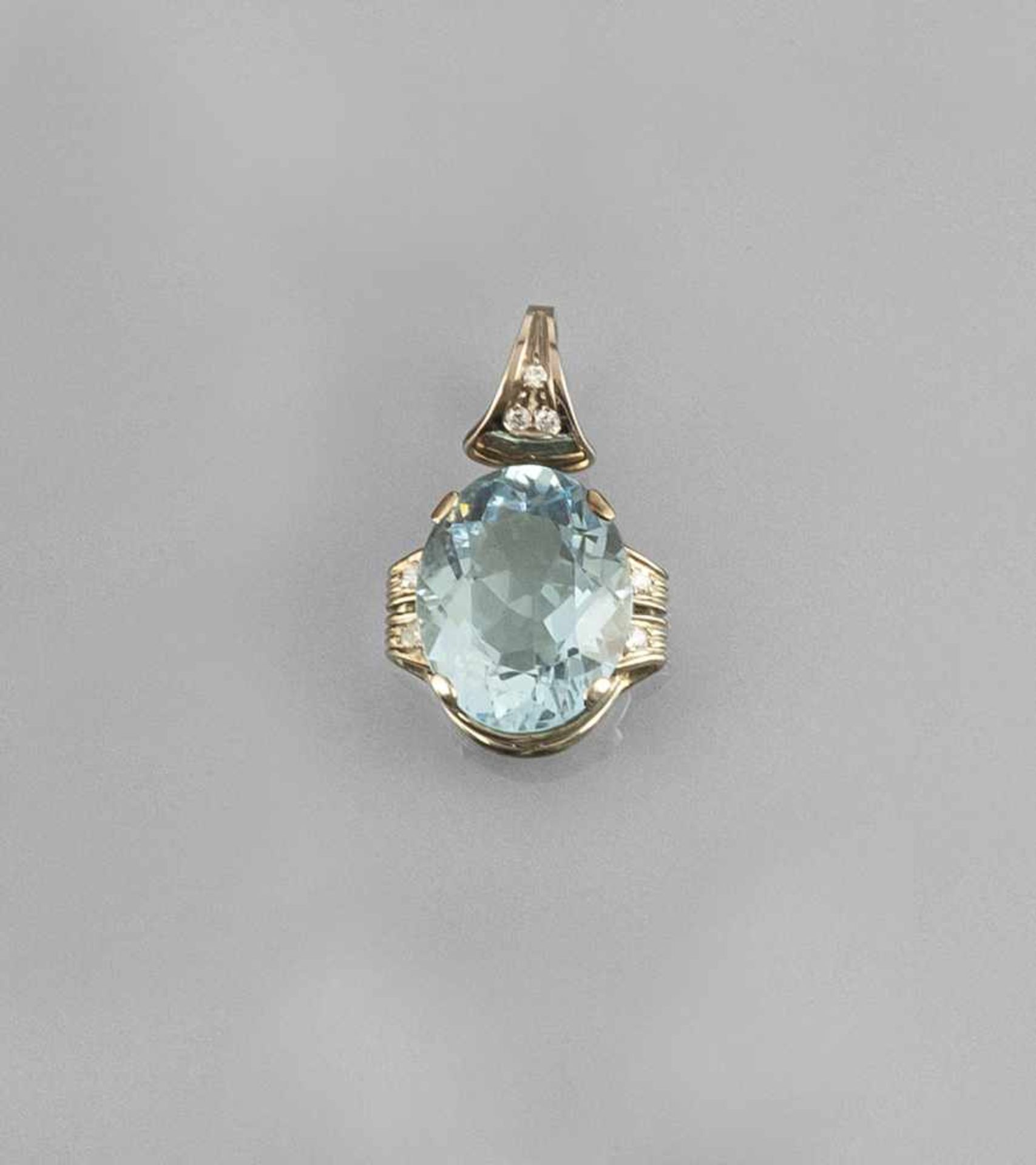 AN AQUAMARINE AND DIAMOND PENDANT. 585 white gold, oval cut aquamarine c. 15 ct., 7 small