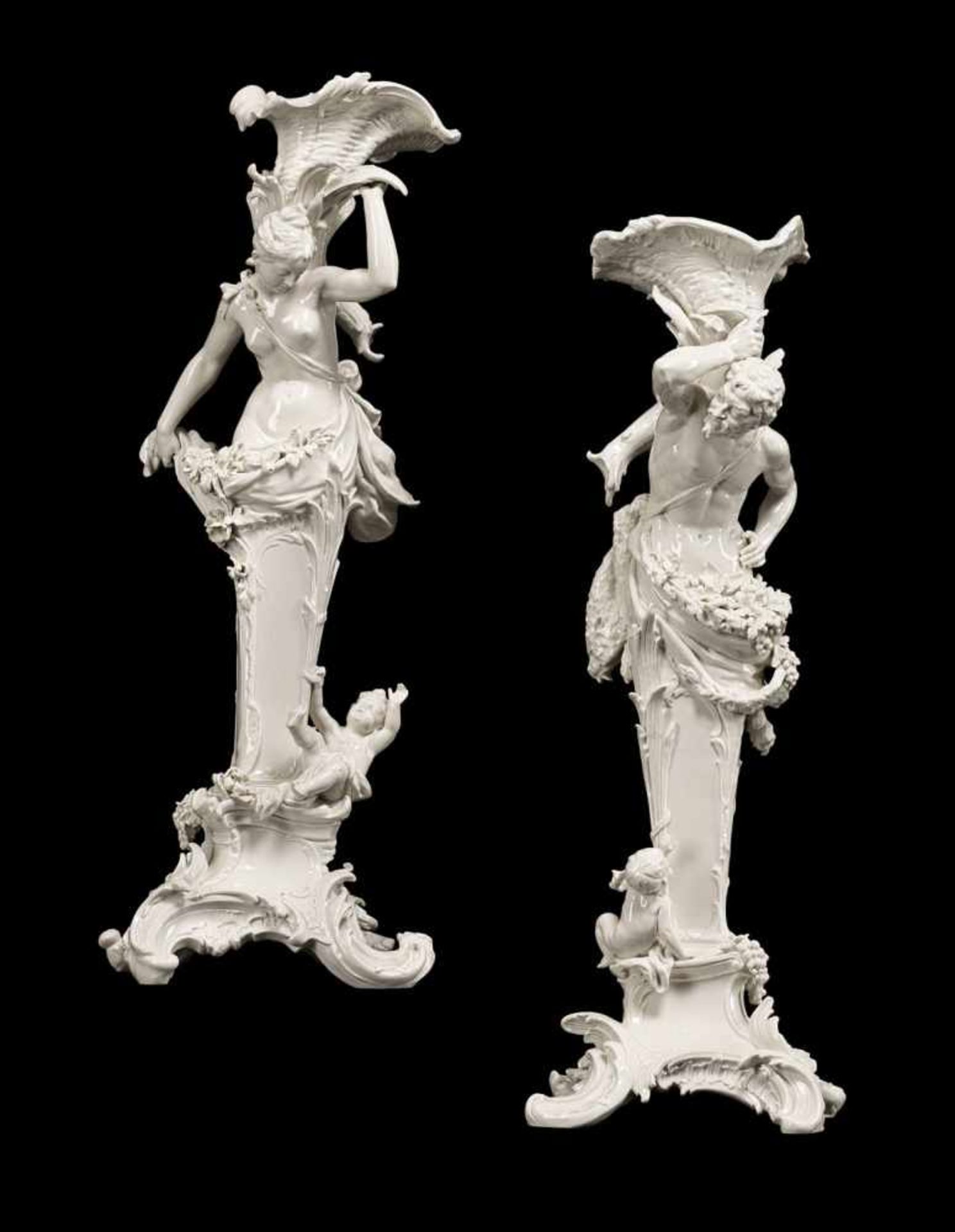 A PAIR OF FIGURAL PORCELAIN CANDLESTICKS WITH FAUN AND FLORA, KPM, Berlin, late 19th century.
