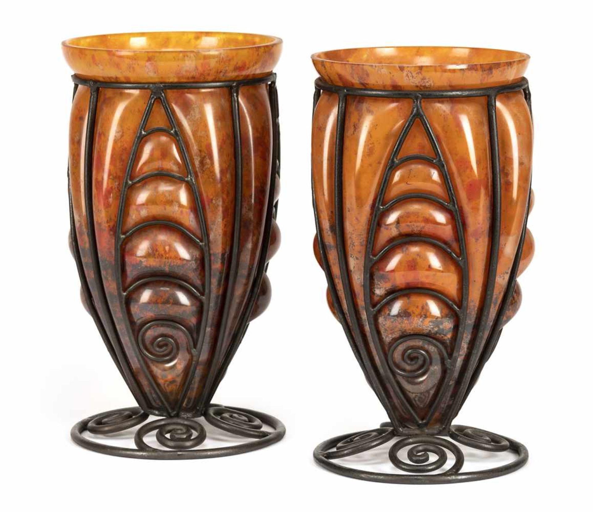 A PAIR OF GLASS AND WROUGHT IRON VASES, probably Daum/Louis Majorelle, Nancy, c. 1925. Unsigned.Paar