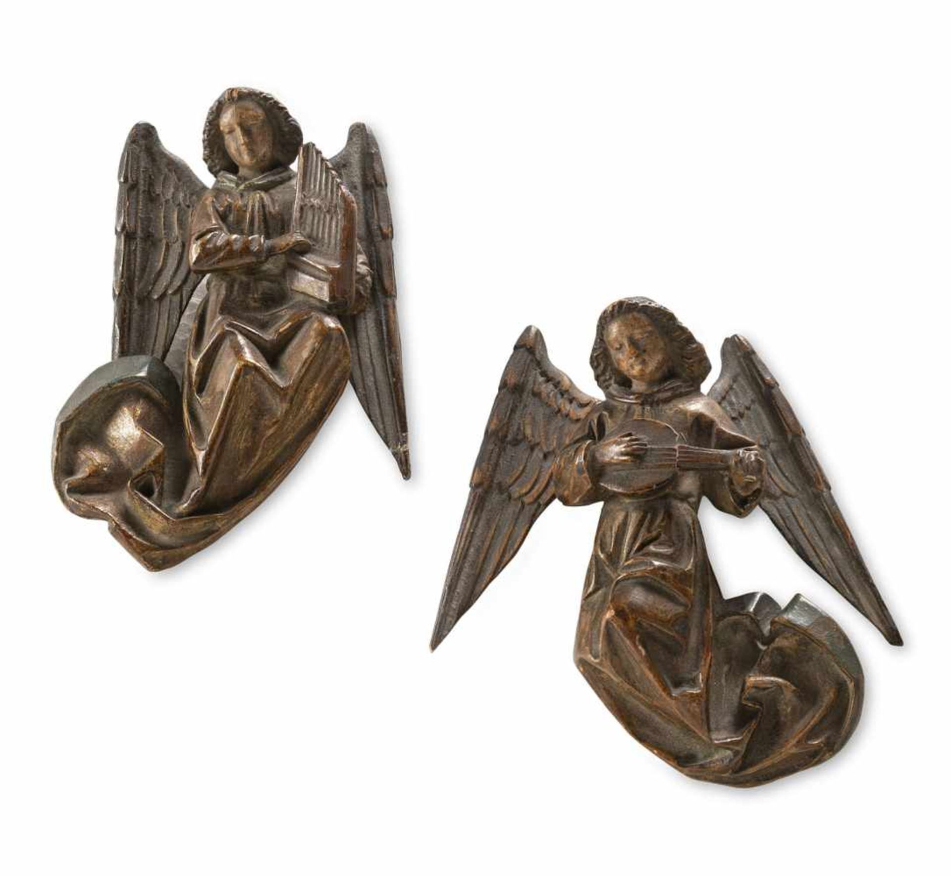 A PAIR OF MUSIC MAKING GLORIFICATION ANGELS, Medieval style, late 19th century. Limewood, carved