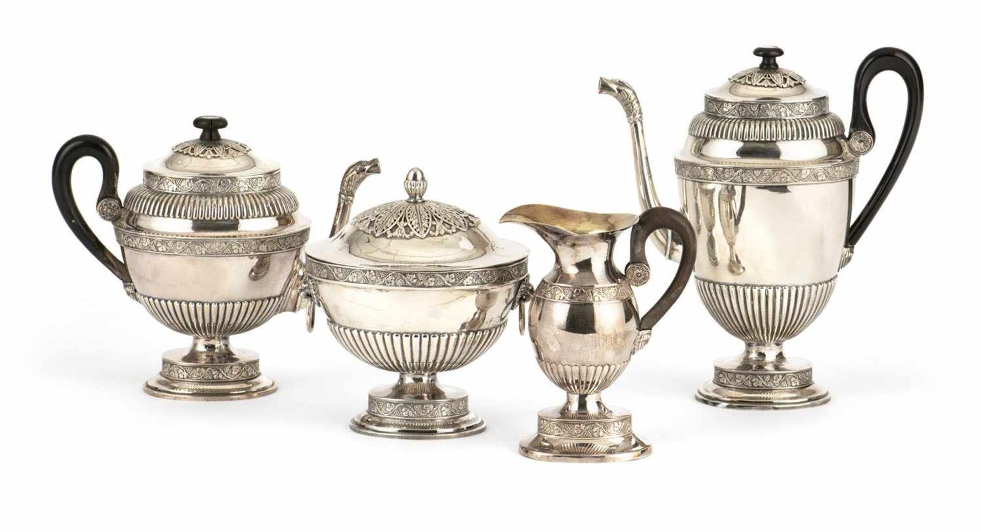 NEOCLASSICAL RUSSIAN COFFEE AND TEA SILVER SERVICE, comprising coffeepot, teapot, milkpot and