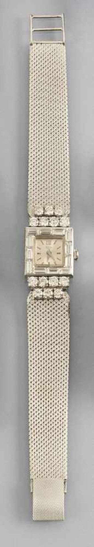 A LADY'S DIAMOND AND GOLD WATCH, RsW, 1970ies. 750 white gold watchcase and bracelet. Set with 14