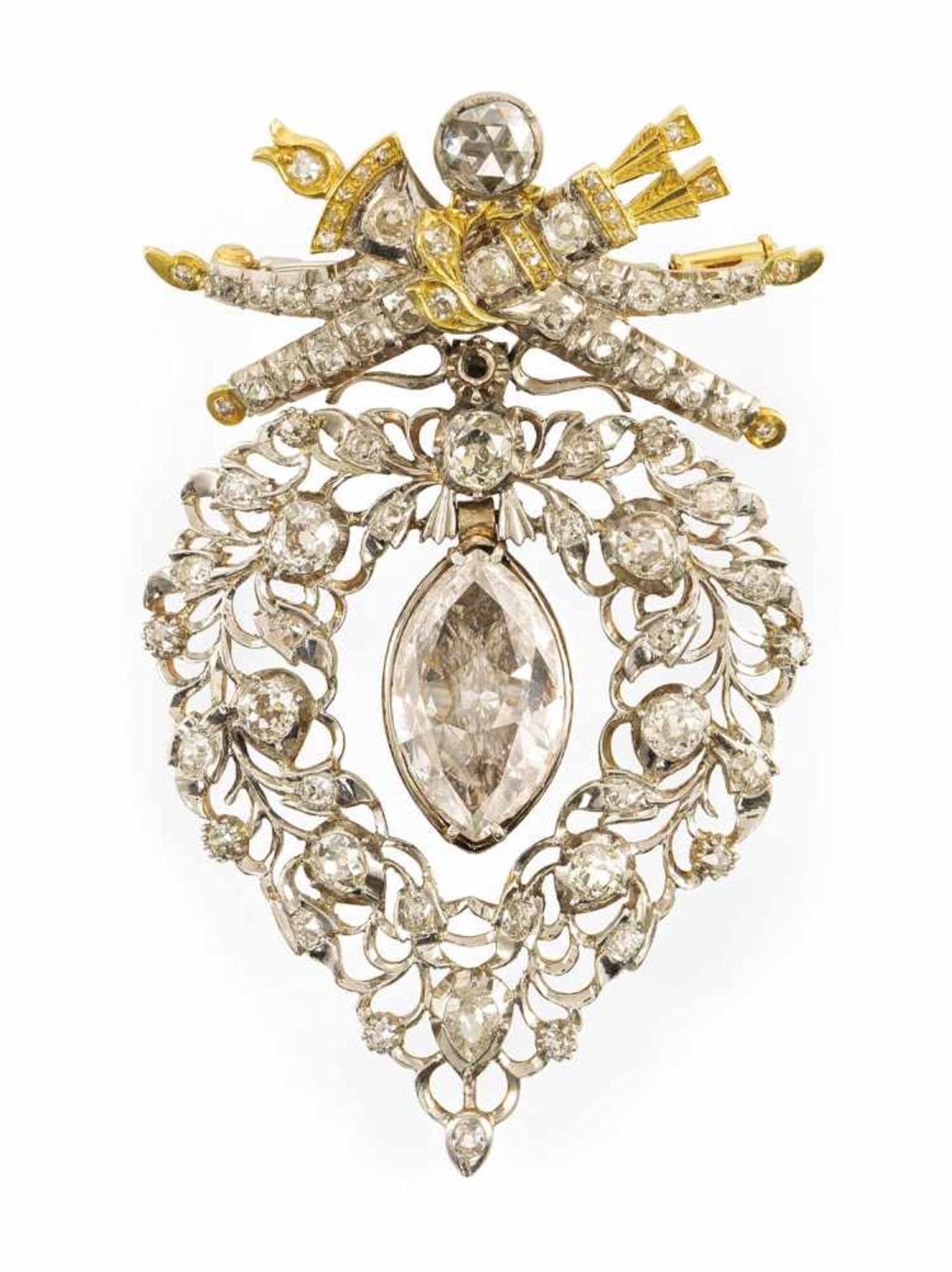 AN ELABORATE BAROQUE STYLE DIAMOND PENDANT/BROOCH. 585 yellow gold at the back and platinum on the