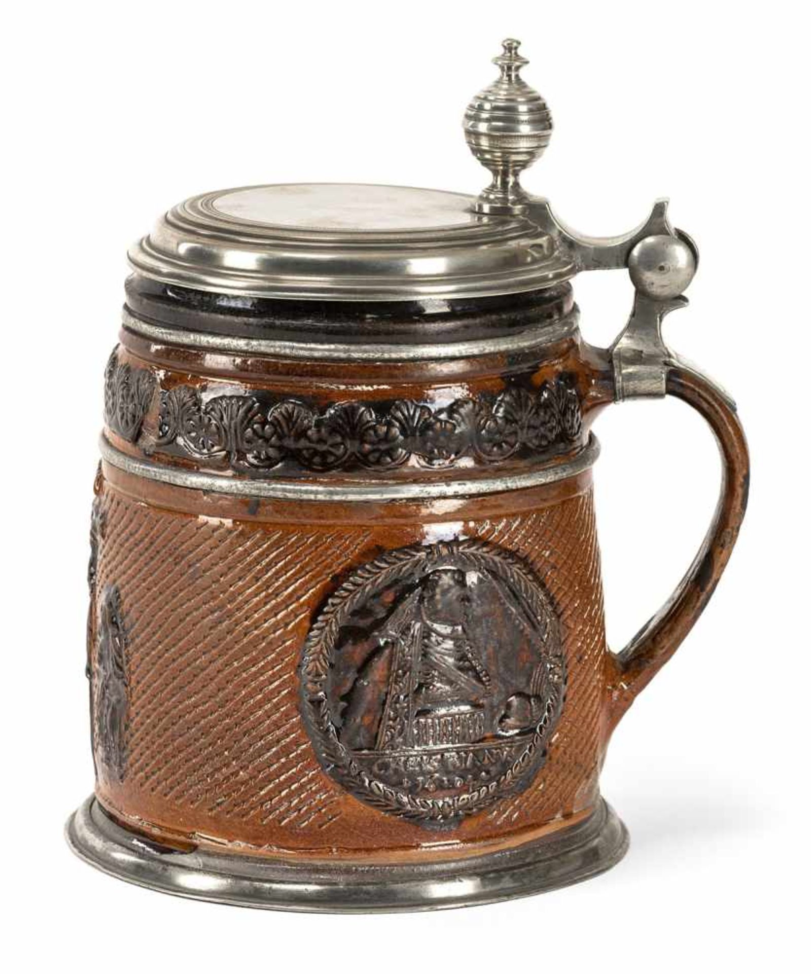 A BIG BROWN GLAZED STEIN, Saxony, 17th century. With relief shaped crucifixtion group at the front