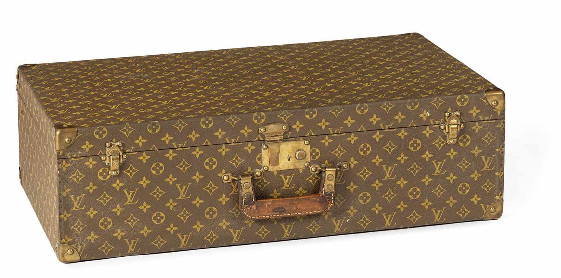 LOUIS VUITTON MONOGRAM CANVAS SUITCASE, probably mid-century. Traces of use, minor damages due to