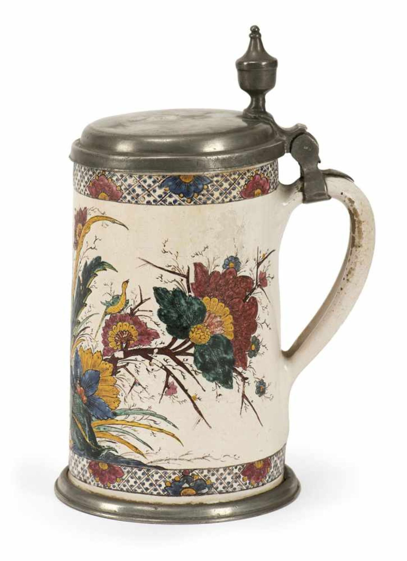 A RARE FLORAL PATTERN FAYENCE TANKARD, decorated "à petit feu", South German, maybe Ansbach or