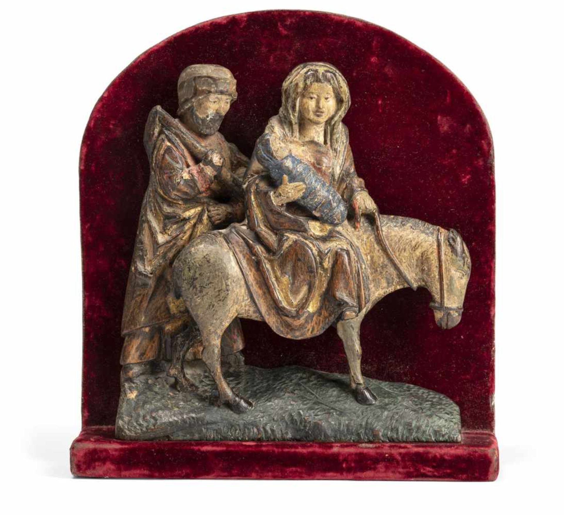 THE FLIGHT INTO EGYPT. Small oakwood relief carving depicting the Holy Family with a donkey on their