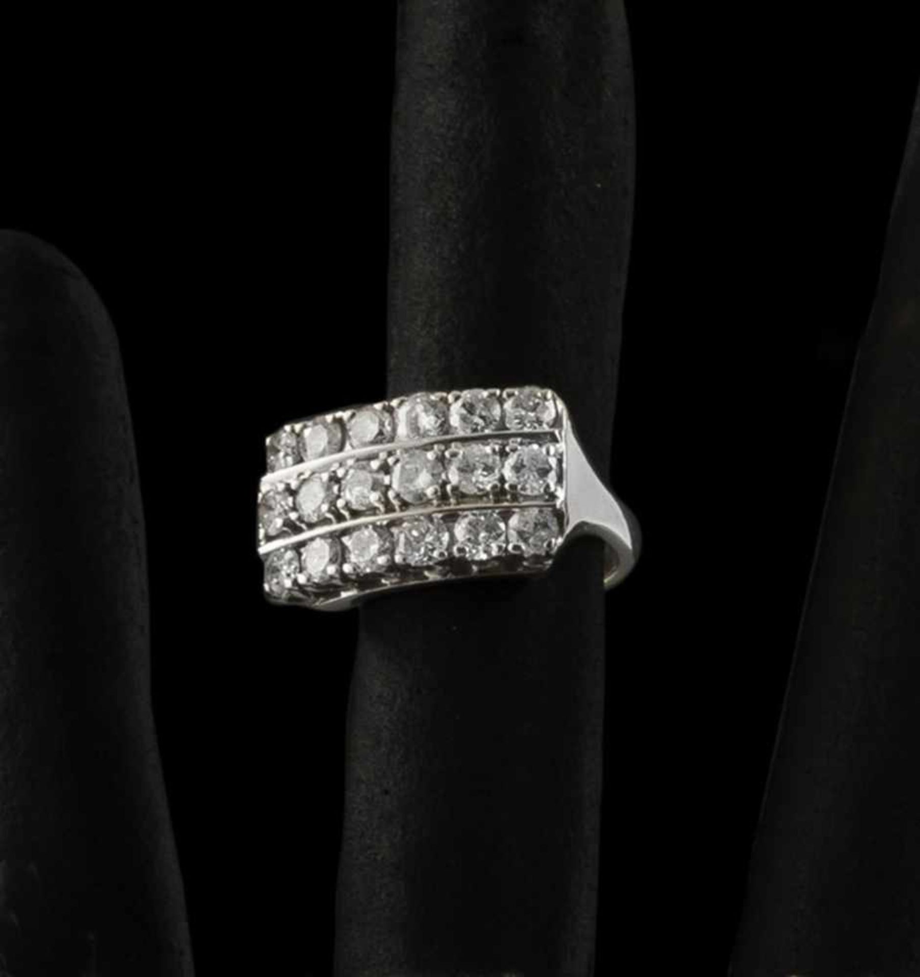 A DIAMOND RING. 14ct yellow and white gold, 18 old-cut diamonds, tog.c. 1,8 ct. C. 5,5 g.