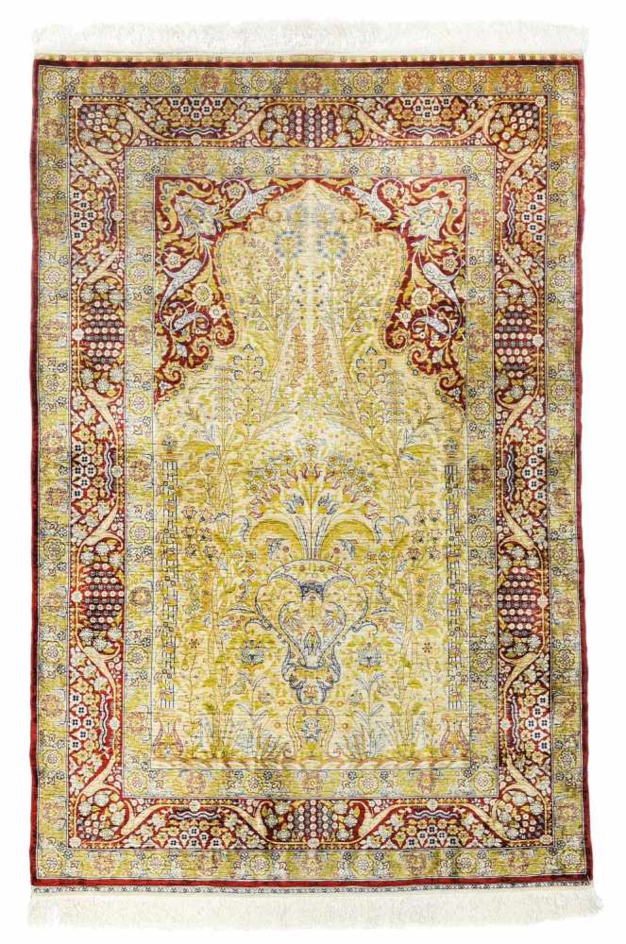 A Hereke silk prayer rug, Turkey, 20th ct. Well preserved.
