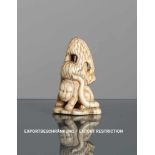 Netsuke eines Tigers unter Bambus aus Elfenbein