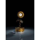 Charmante Uhr in Sonnenblumenform der Restaurations-Zeit