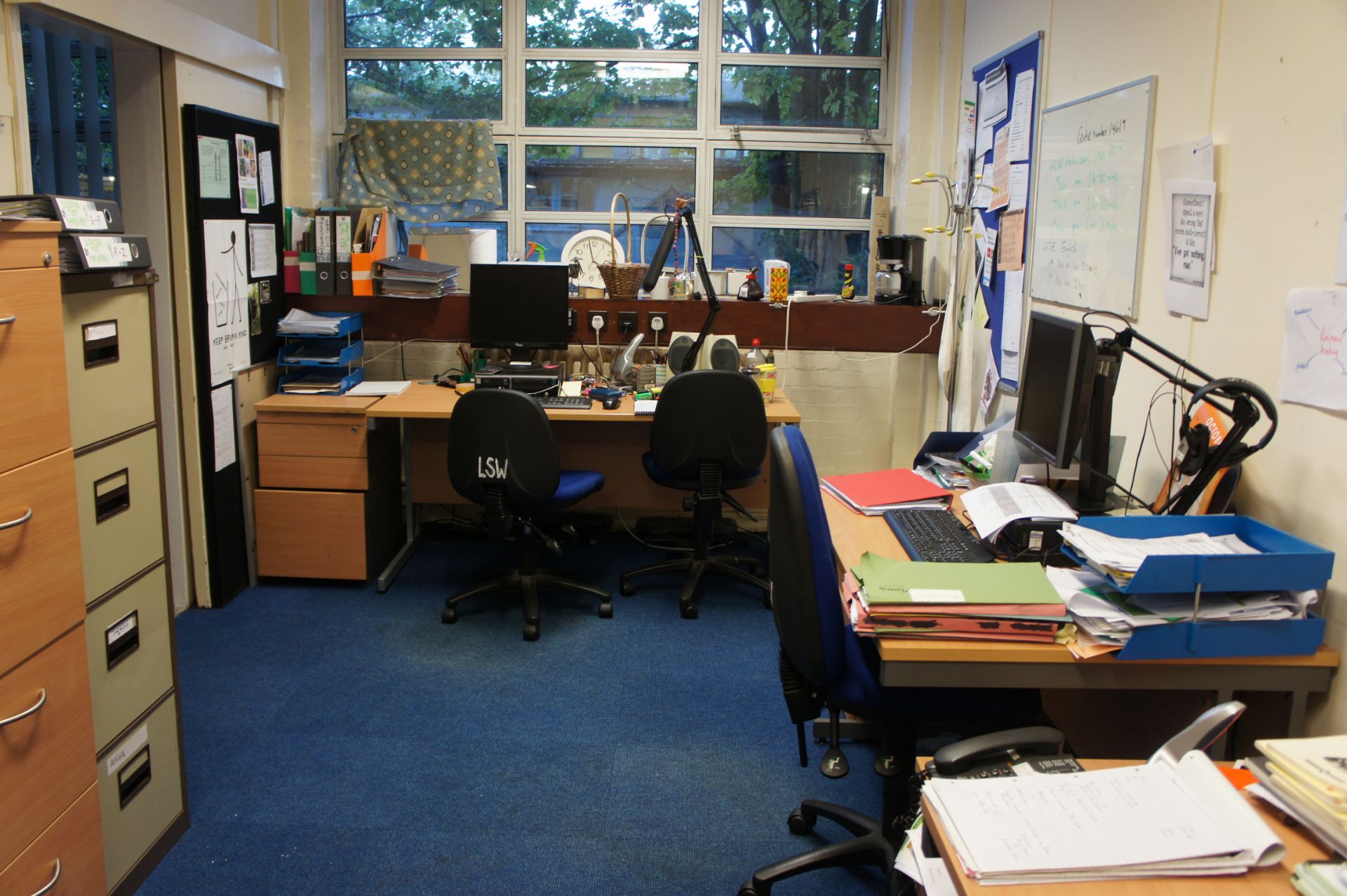 Contents of room comprising, 3 x four drawer filing cabinets, 2 x cupboards, bookcase, 3 x chairs, 2