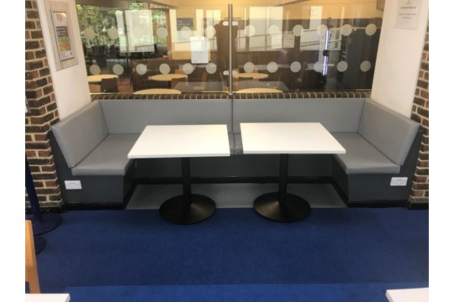 Soft Seating Area With Two Tables