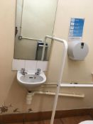 Contents of disabled toilet, toilet, sink, hand drier, safety rails, mirror, as lotted