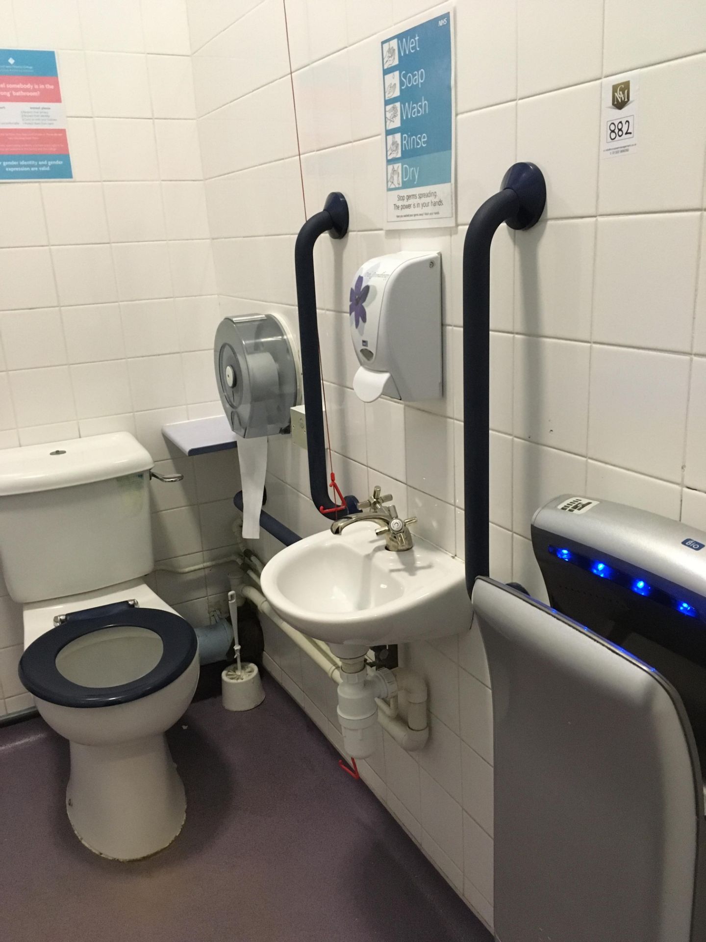 Contents of the disabled toilet, 1 x cubicle, hand drier, mirror, safety rails
