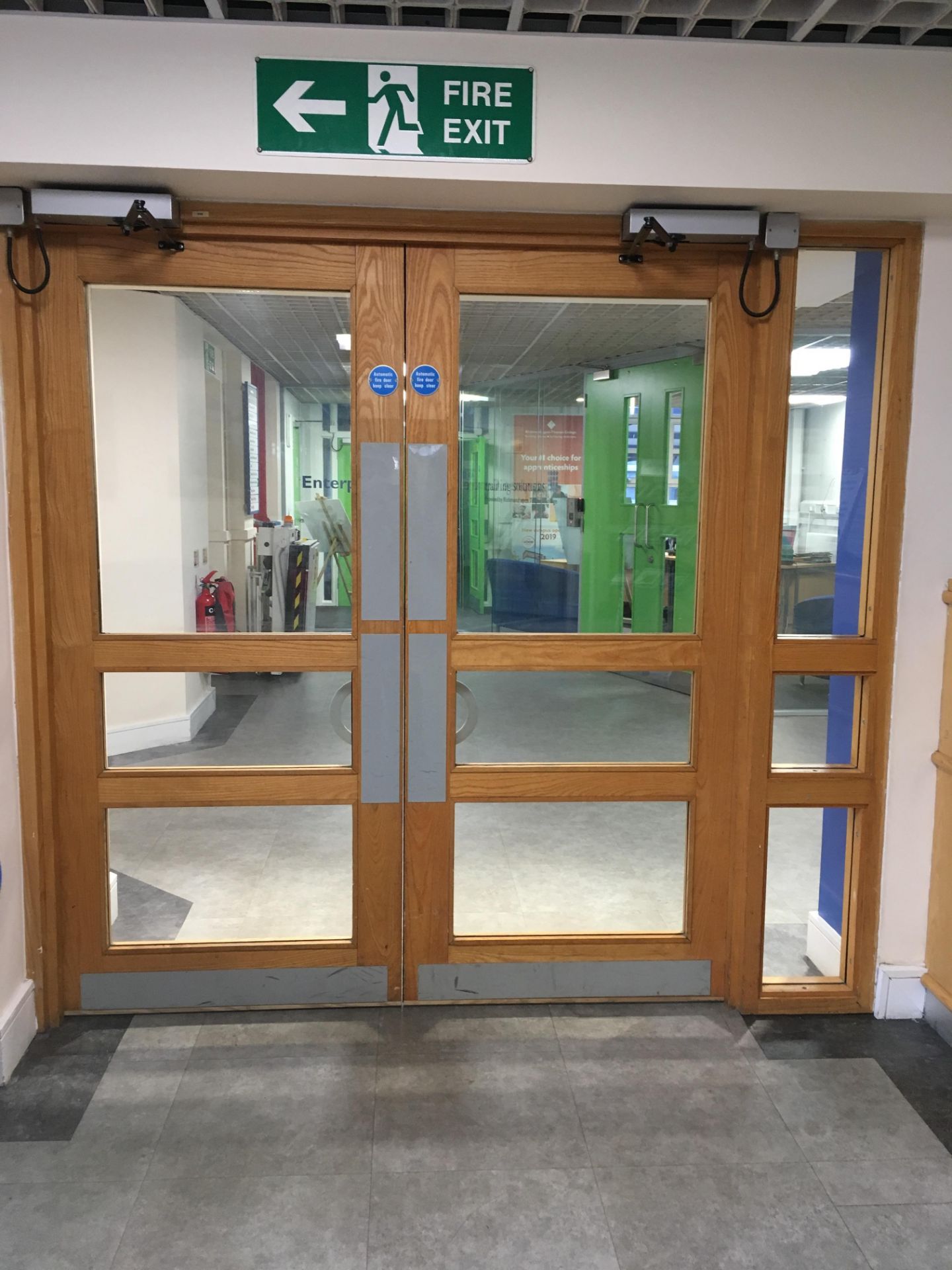 Double fully glazed automatic fire door