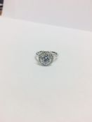 1.50Ct Halo Style Diamond Ring Set In 18Ct White Gold.